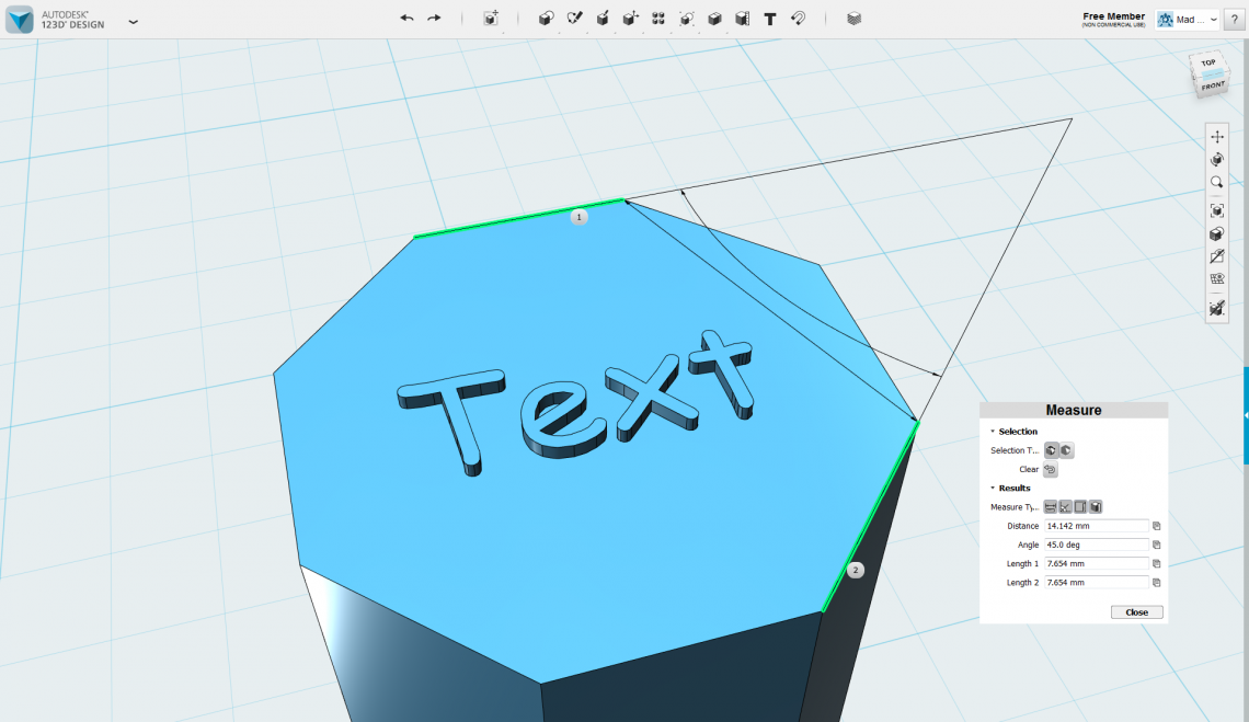 The text and measure tools in action. How 'bout some love for Comic Sans? The measure tool shows the shortest length between the two selected edges, the anlge between them and the lengths of the edges themselves.